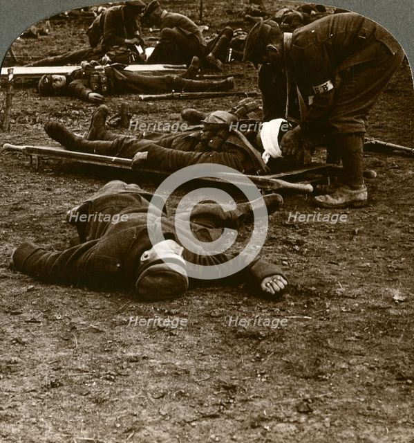 After the storm and stress of battle, caring for the wounded, World War I, 1914-1918.Artist: Realistic Travels Publishers