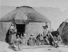 Afghan nomads, seated outside tent, 1919. Creator: Bain News Service
