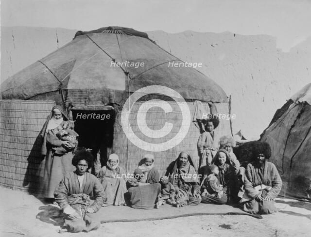 Afghan nomads, seated outside tent, 1919. Creator: Bain News Service.