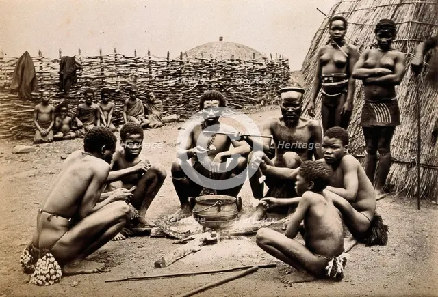 Africa: men of the Hlubi tribe eating, between 1800 and 1899. Creator: Unknown.