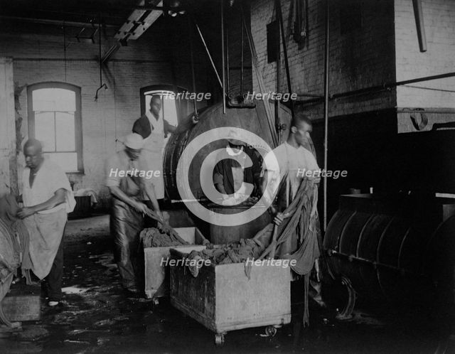 African American workers doing laundry at the Bureau of Engraving & Printing, c1895. Creator: Frances Benjamin Johnston.