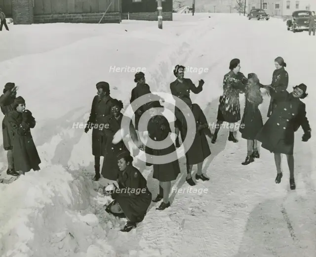 African American members of the Women's Army Corps standing in the snow and..., New York, 1946. Creator: Unknown.