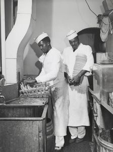 African American restaurant workers, Investment Pharmacy, Washington, D.C., July 1941. Creators: Farm Security Administration, Jack Delano