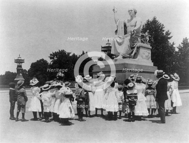 African American school children facing the Horatio Greenough statue of George Washing..., (1899?). Creator: Frances Benjamin Johnston.