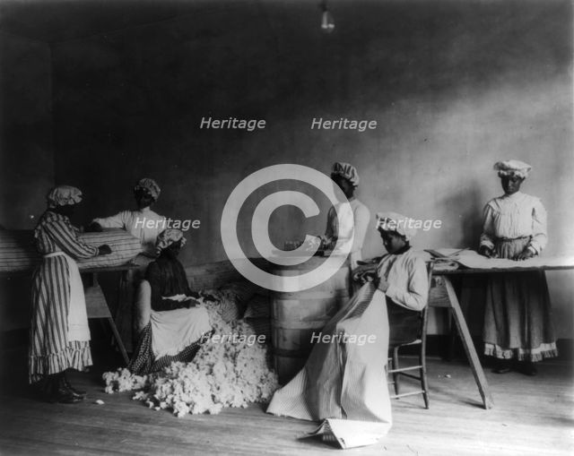 African American students in mattress-making class, Tuskegee Institute, Tuskegee, Alabama, 1902. Creator: Frances Benjamin Johnston.