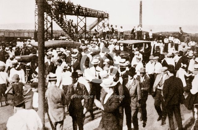 African Americans and whites leaving the beach as trouble begins, Chicago, Illinois, USA, c1919. Artist: Unknown