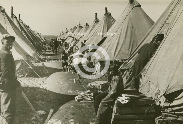 African Americans at Forrest City flood refugee camp, Arkansas, 1930s.  Creators: Farm Security Administration, Edwin Locke.