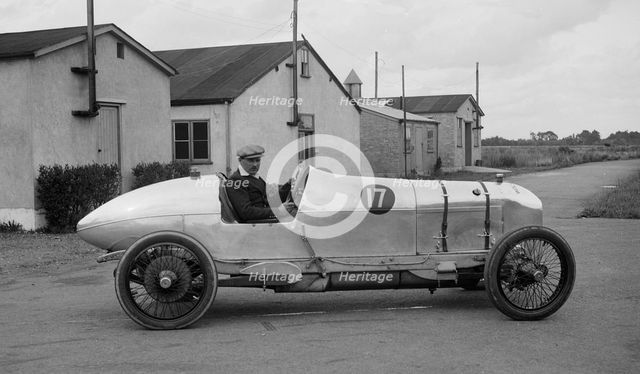 AG Miller in his Wolseley single-seater racer at Brooklands, Surrey, 1920s. Artist: Bill Brunell.