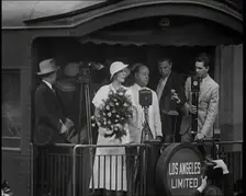 Aimee Semple McPherson Conducting a Crowd in Singing a Hymn, 1930s. Creator: British Pathe Ltd