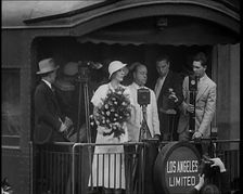 Aimee Semple McPherson Conducting a Crowd in Singing a Hymn, 1930s. Creator: British Pathe Ltd