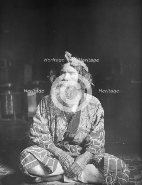 Ainu chief wearing a headdress, 1908. Creator: Arnold Genthe.