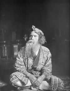 Ainu chief wearing a headdress, 1908. Creator: Arnold Genthe