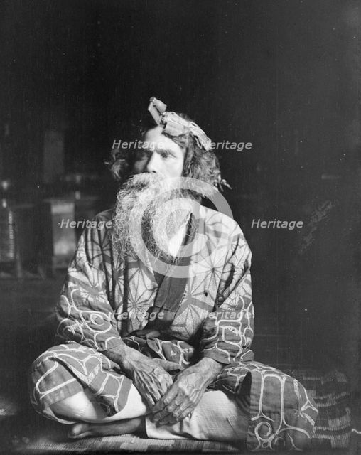 Ainu chief wearing a headdress, 1908. Creator: Arnold Genthe.