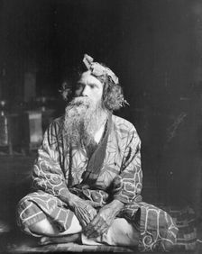 Ainu chief wearing a headdress, 1908. Creator: Arnold Genthe