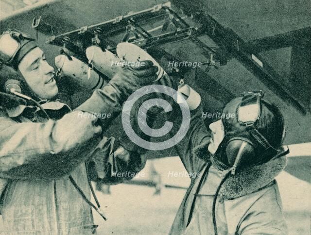 Air observer receiving bombing training, 1940. Artist: Unknown