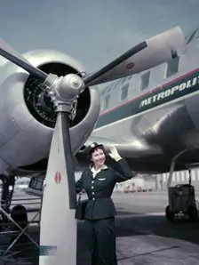 Air hostess in front of the first Convair CV-440 Metropolitan aircraft in Sweden, 1956. Creator: Göran Algård