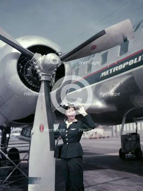 Air hostess in front of the first Convair CV-440 Metropolitan aircraft in Sweden, 1956. Creator: Göran Algård.