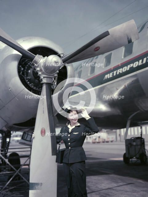 Air hostess in front of the first Convair CV-440 Metropolitan aircraft in Sweden, 1956. Artist: Göran Algård
