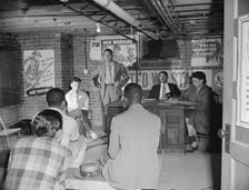 Air raid wardens meeting in zone nine, Southwest area, Washington, D.C, 1942. Creator: Gordon Parks