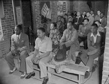 Air raid wardens meeting in zone nine, Southwest area, Washington, D.C, 1942. Creator: Gordon Parks