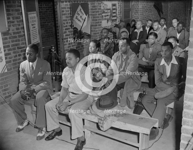 Air raid wardens' meeting in zone nine, Southwest area, Washington, D.C, 1942. Creator: Gordon Parks.