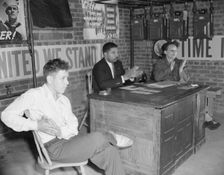 Air raid wardens meeting in zone nine, Southwest area, Washington, D.C, 1942. Creator: Gordon Parks