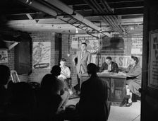 Air raid wardens meeting in zone nine, Southwest area, Washington, D.C, 1942. Creator: Gordon Parks