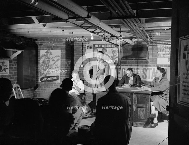 Air raid wardens' meeting in zone nine, Southwest area, Washington, D.C, 1942. Creator: Gordon Parks.