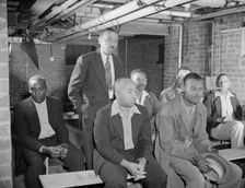 Air raid wardens meeting in zone nine, Southwest area, Washington, D.C, 1942. Creator: Gordon Parks
