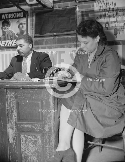 Air raid wardens' meeting in zone nine, Southwest area, Washington, D.C, 1942. Creator: Gordon Parks.