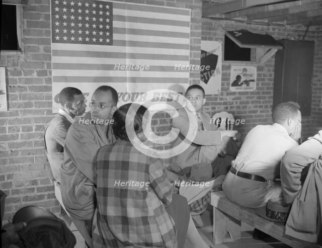 Air raid wardens' meeting in zone nine, Southwest area, Washington, D.C, 1942. Creator: Gordon Parks.