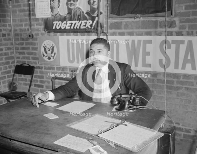 Air raid wardens' meeting in zone nine, Southwest area, Washington, D.C, 1942. Creator: Gordon Parks.