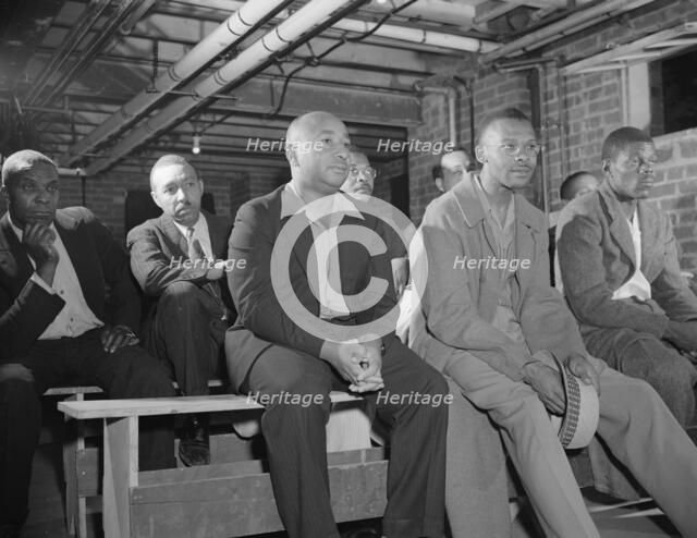 Air raid wardens' meeting in zone nine, Southwest area, Washington, D.C, 1942. Creator: Gordon Parks.