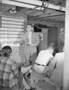 Air raid wardens meeting in zone nine, Southwest area, Washington, D.C, 1942. Creator: Gordon Parks