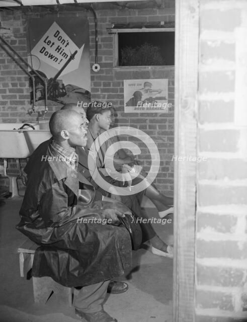 Air raid wardens' meeting in zone nine, Southwest area, Washington, D.C, 1942. Creator: Gordon Parks.