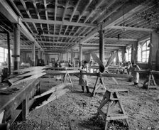 Aircraft manufacturing, Hampton & Sons Ltd works, 43 Belvedere Road, Lambeth, London, July 1916. Artist: H Bedford Lemere