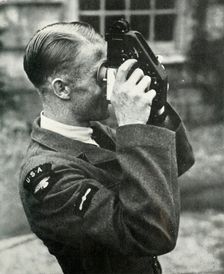Airman learning navigation during the Second World War, 1941. Creator: Charles Brown