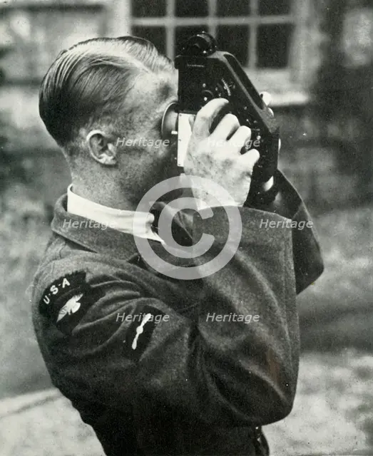 Airman learning navigation during the Second World War, 1941. Creator: Charles Brown.