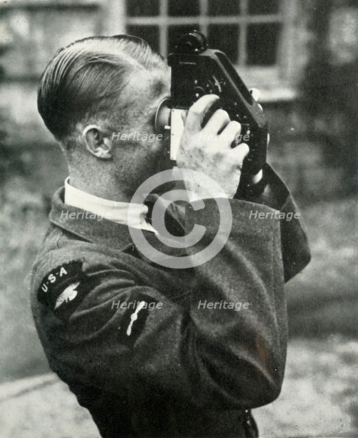 Airman learning navigation during the Second World War, 1941. Creator: Charles Brown.