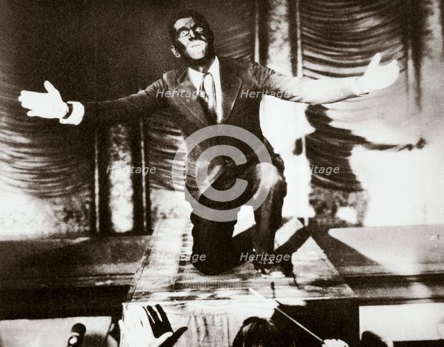 Al Jolson, American singer, in the final scene from the film 'The Jazz Singer', 1927. Creator: Unknown.