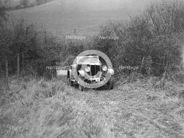 AL Watson's MG 18/80 with sports body competing in the Inter-Varsity Trial, November 1931. Artist: Bill Brunell.