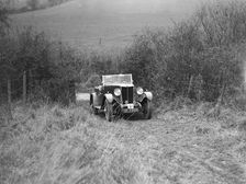 AL Watson's MG 18/80 with sports body competing in the Inter-Varsity Trial, November 1931. Artist: Bill Brunell