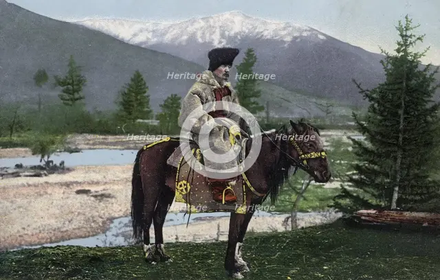 Altai Man in National Costume (Hat: Kuaraan Boruk, Sheepskin Coat: Ton, with a..., 1911-1913. Creator: Sergei Ivanovich Borisov.