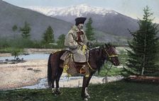 Altai Man in National Costume (Hat: Kuaraan Boruk, Sheepskin Coat: Ton, with a..., 1911-1913. Creator: Sergei Ivanovich Borisov