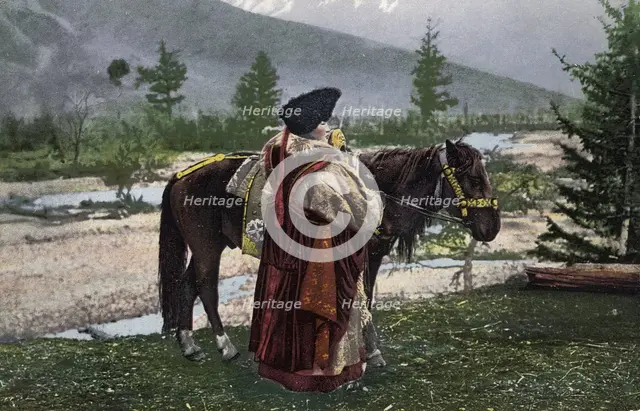 Altai Woman in National Costume (Hat: Kuaraan Boruk, Sheepskin Coat: Ton, Sleeveless..., 1911-1913. Creator: Sergei Ivanovich Borisov.