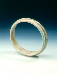 Altered jade flanged ring, Shang dynasty or earlier, China, c1600-1100 BC. Creator: Unknown
