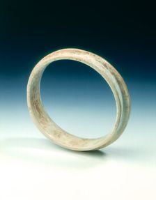 Altered jade flanged ring, Shang dynasty or earlier, China, c1600-1100 BC