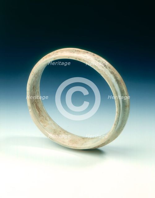 Altered jade flanged ring, Shang dynasty or earlier, China, c1600-1100 BC. Artist: Unknown