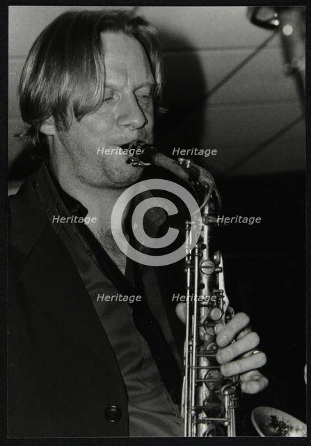 Alto saxophonist Matt Wates playing at The Fairway, Welwyn Garden City, Hertfordshire, 2003. Artist: Denis Williams