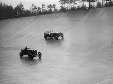 Alvis and Sunbeam stripped 4-seaters racing at a BARC meeting, Brooklands, Surrey, 1931 Artist: Bill Brunell